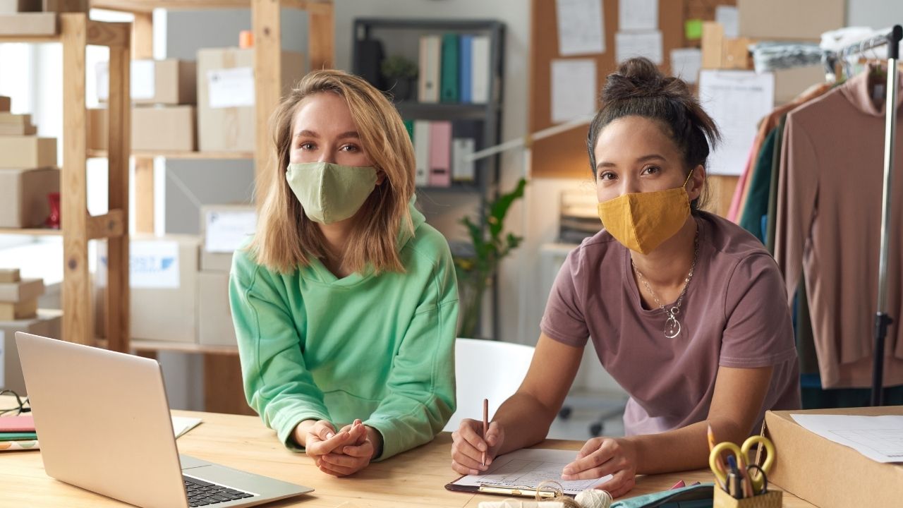 Canadian Visa Expert - Working women with masks